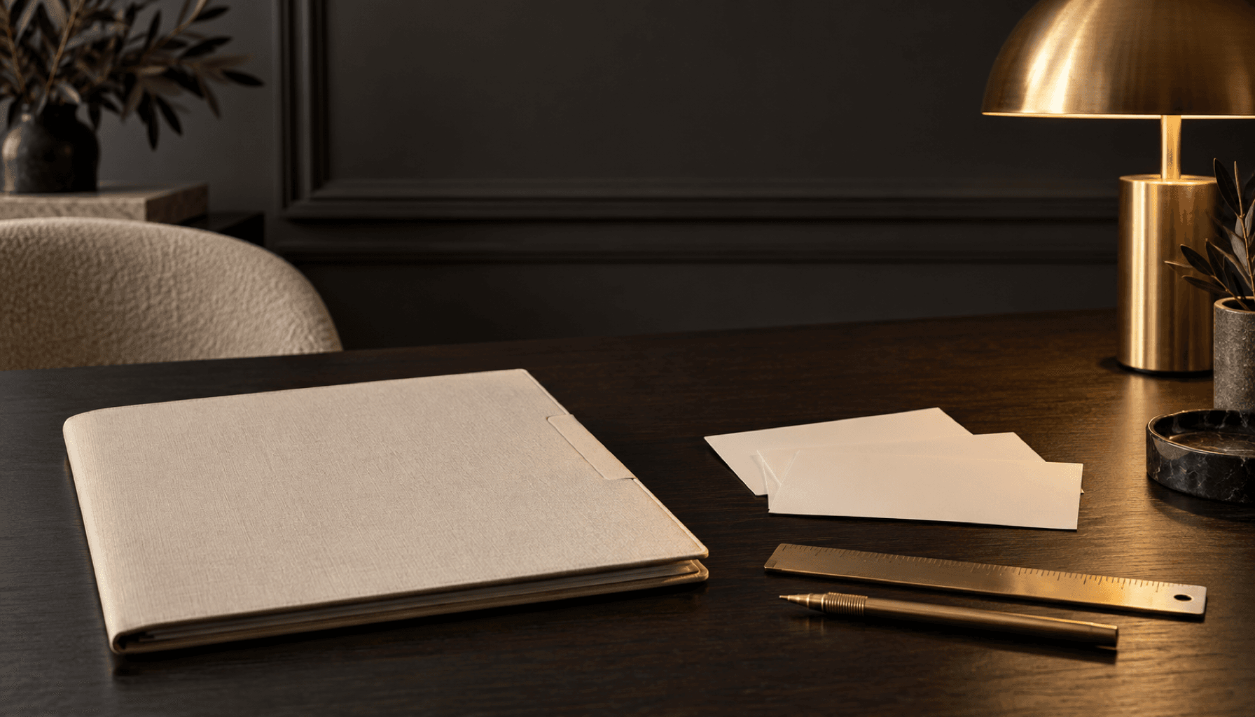 Folder, cards, and brass ruler.